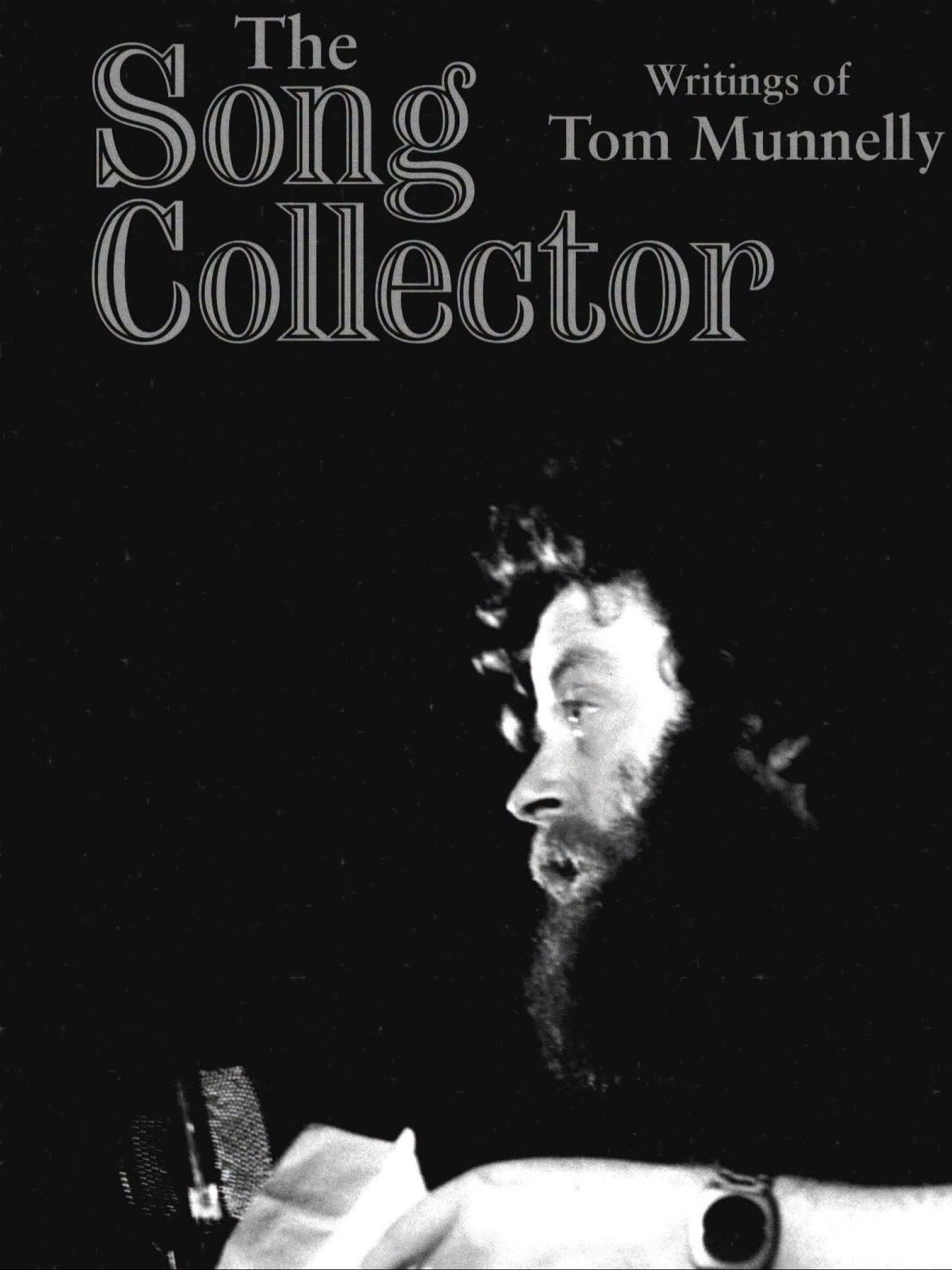 Book cover of 'The Song Collector' by Tom Munnelly with a black and white photo of a person holding a microphone.