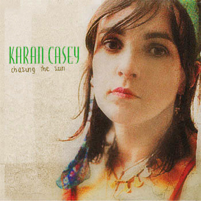 Album cover with a person's face and 'Karan Casey chasing the sun' text.
